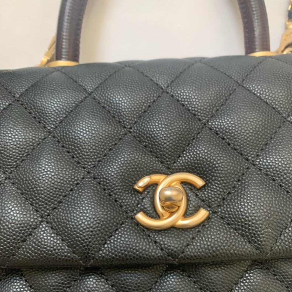 Chanel small flap bag with top handle